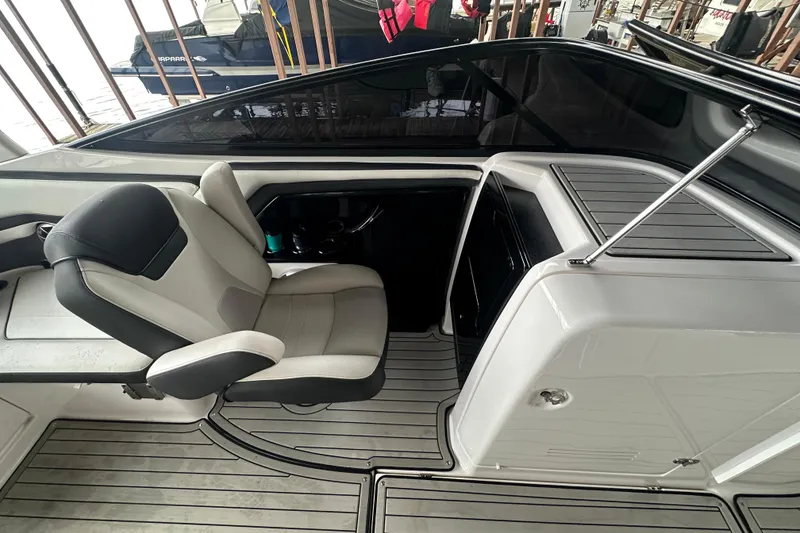 Slide: The Image of 2020 Yamaha Boats 242SE interior with sleek seating and modern design. - 21