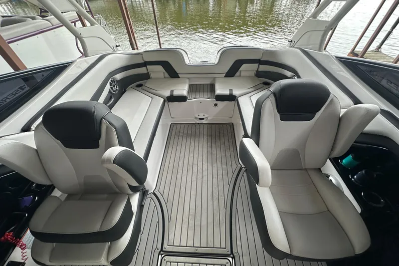 Slide: The Image of 2020 Yamaha Boats 242SE interior with sleek seating and modern design. - 22