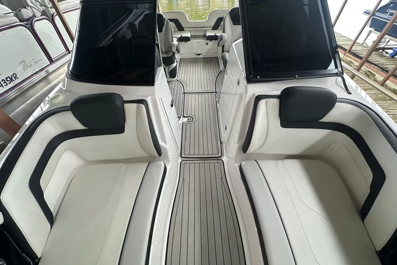 Slide: The Image of 2020 Yamaha Boats 242SE interior with sleek seating and modern design. - 29