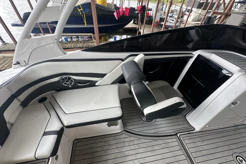 Slide: The Image of 2020 Yamaha Boats 242SE interior with sleek seating and modern design. - 32