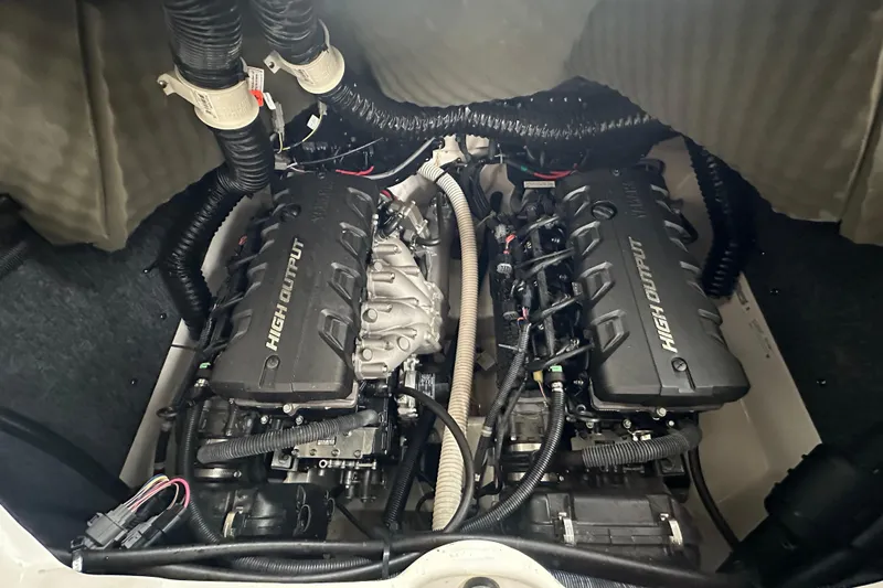 Slide: The Image of 2020 Yamaha Boats 242SE high output engine compartment, showcasing dual engines. - 33