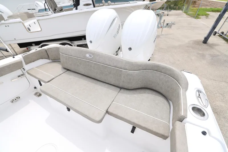 Slide: The Image of 2026 Sea Hunt Ultra 265 SE boat dashboard with Garmin navigation system. - 13