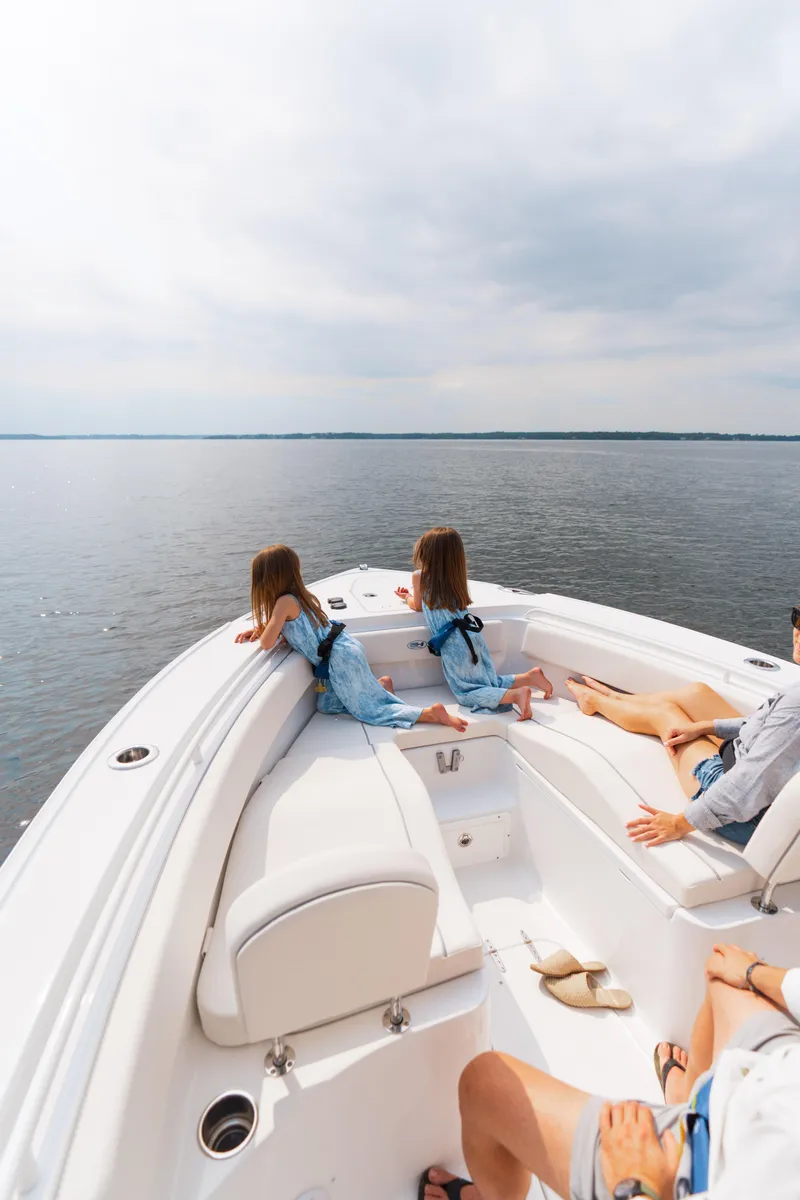 Slide: The Image of 2026 Sea Hunt Ultra 265 SE boat with sleek hardtop and modern design features. - 19