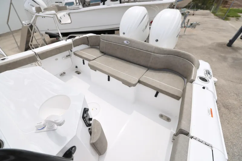 Slide: The Image of 2026 Sea Hunt Ultra 265 SE boat console with Garmin navigation system. - 4