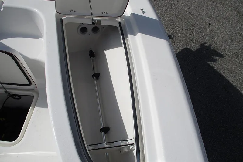 Slide: The Image of Open storage compartment on 2026 Sea Pro 210 Bay boat, showcasing interior space. - 13