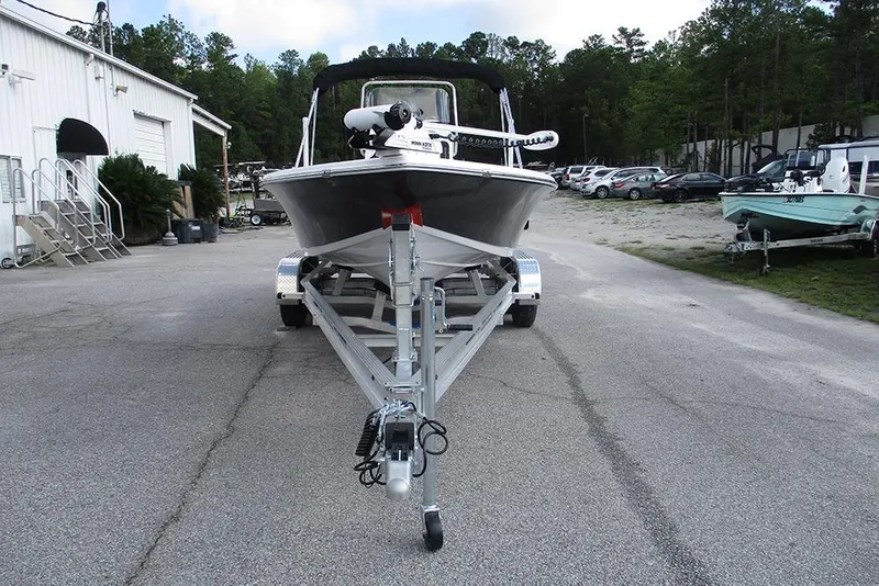 Slide: The Image of 2026 Sea Pro 210 Bay boat on trailer in outdoor parking area. - 3