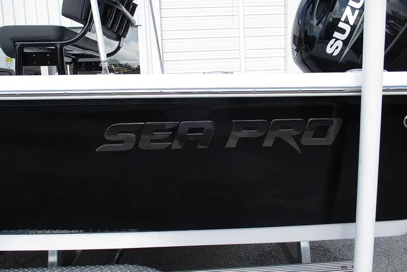 Slide: The Image of 2026 Sea Pro 210 Bay boat with Suzuki engine, black exterior detail. - 8