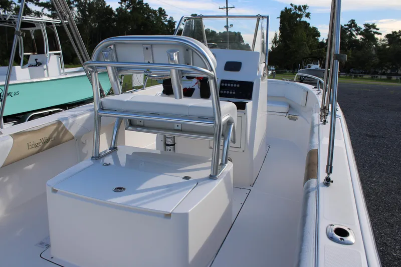Slide: The Image of 2015 Edgewater 188CC boat interior with helm, seating, and control panel. - 14