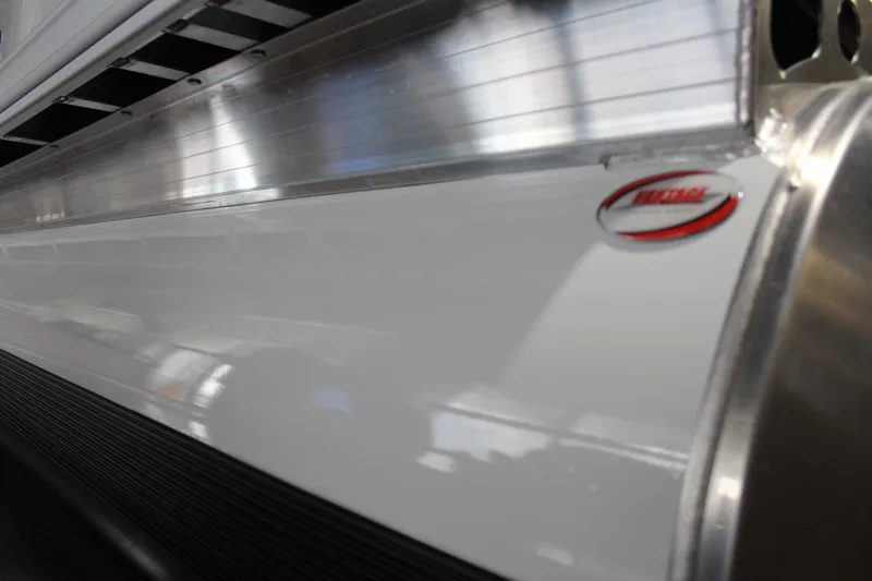 Slide: The Image of 2026 Sun Tracker Party Barge 20 DLX, sleek aluminum exterior detail. - 10