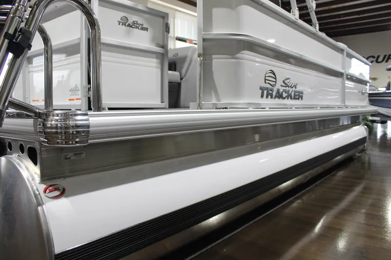 Slide: The Image of 2026 Sun Tracker Party Barge 20 DLX pontoon boat, sleek design, showroom display. - 4