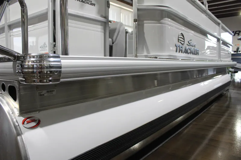 Slide: The Image of 2026 Sun Tracker Party Barge 20 DLX pontoon boat, sleek design, metallic accents. - 5