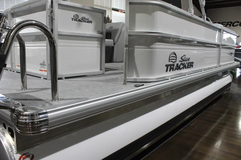 Slide: The Image of 2026 Sun Tracker Party Barge 20 DLX pontoon boat, sleek design, showroom display. - 8