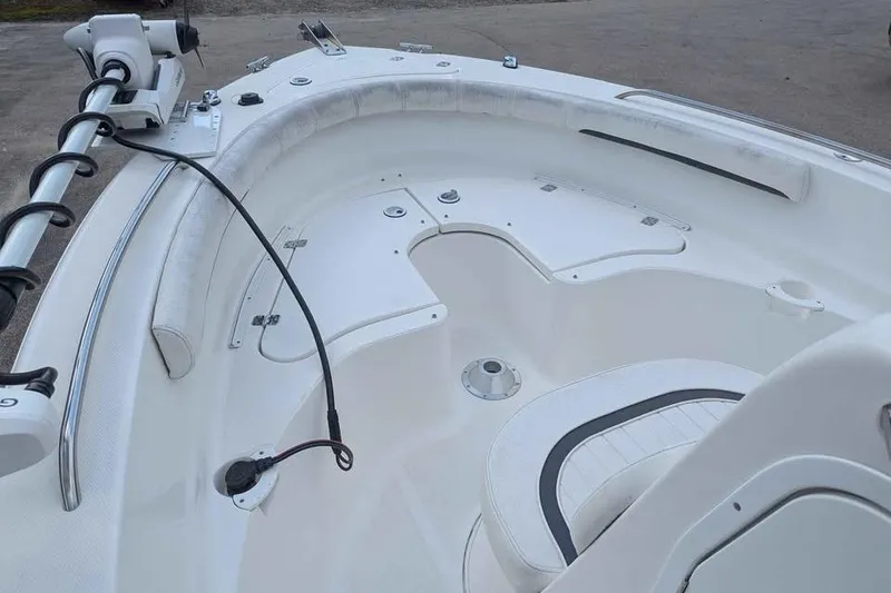 Slide: The Image of 2011 Sea Fox 206 CC PRO Series boat interior with seating and fishing equipment. - 10