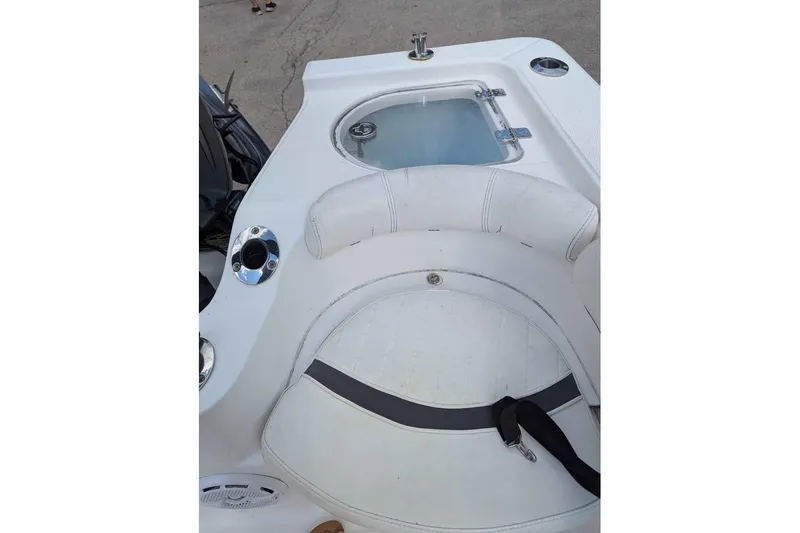 Slide: The Image of 2011 Sea Fox 206 CC PRO Series boat interior with seating and storage. - 13
