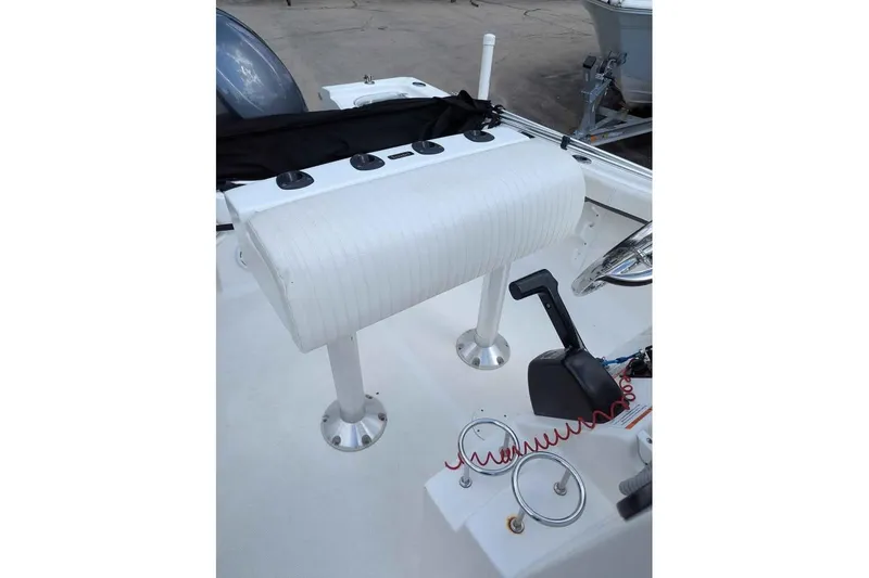 Slide: The Image of 2011 Sea Fox 206 CC PRO Series boat console with controls and seating. - 14
