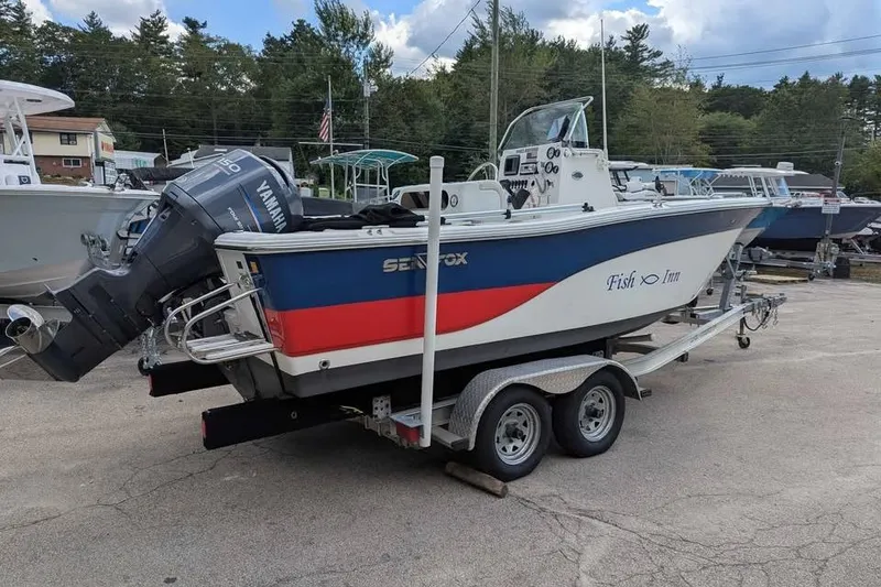 Slide: The Image of 2011 Sea Fox 206 CC PRO Series boat on trailer with Yamaha outboard motor. - 2