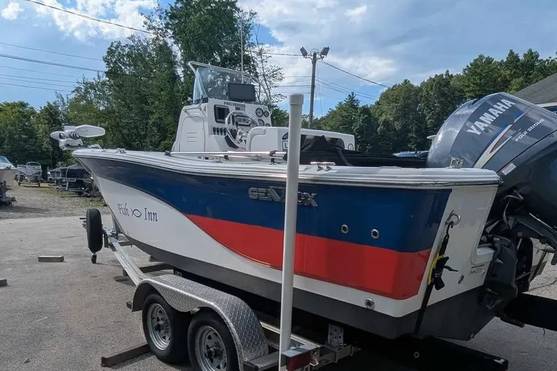 Slide: The Image of 2011 Sea Fox 206 CC PRO Series boat on trailer with Yamaha outboard motor. - 4