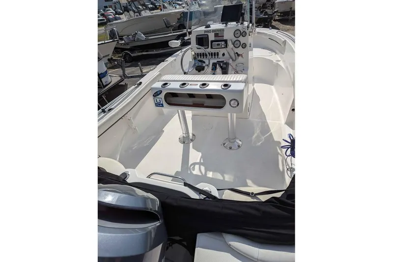 Slide: The Image of 2011 Sea Fox 206 CC PRO Series boat interior with control panel and seating. - 6