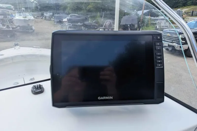 Slide: The Image of Garmin navigation system on 2011 Sea Fox 206 CC PRO Series boat dashboard. - 9