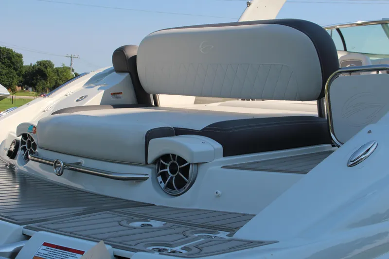 Slide: The Image of 2023 Crownline E285 boat with sleek seating and modern design features. - 32
