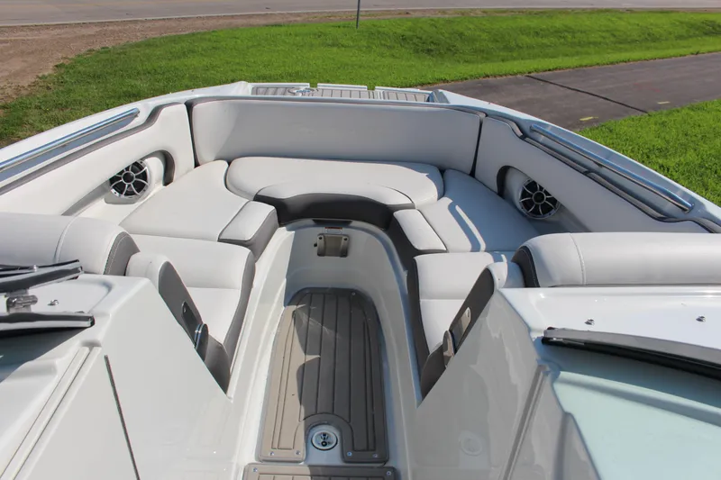 Slide: The Image of 2023 Crownline E285 boat interior with spacious seating and modern design. - 47