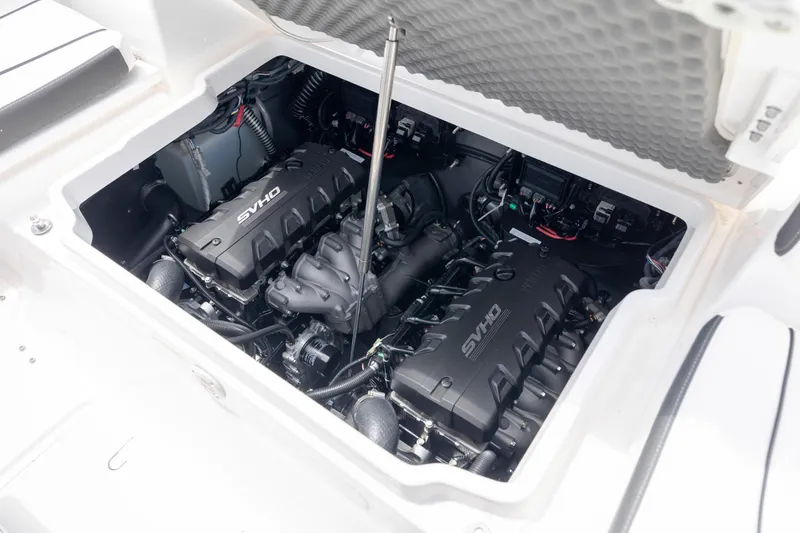 Slide: The Image of 2024 Yamaha Boats 255 FSH Sport H engine compartment with dual SVHO engines. - 20