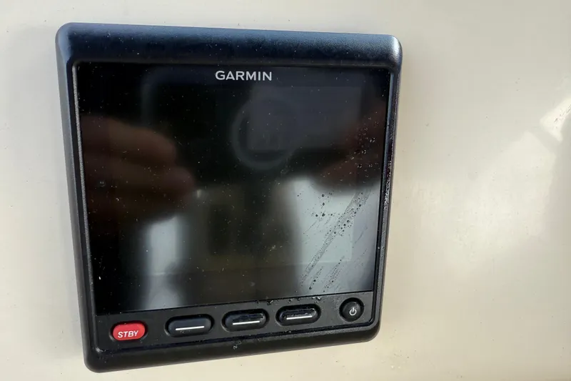 Slide: The Image of Garmin device on 2008 Island Packet 370 yacht, showing buttons and screen. - 18