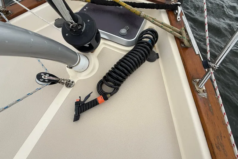 Slide: The Image of Deck of 2008 Island Packet 370 sailboat with coiled rope and rigging. - 33