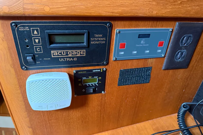 Slide: The Image of Control panel of a 2008 Island Packet 370 sailboat with monitoring systems. - 78