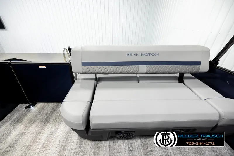Slide: The Image of 2026 Bennington 22 MSBSE boat interior with gray seating and blue accents. - 15