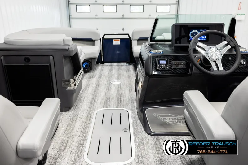 Slide: The Image of Interior of 2026 Bennington 22 MSBSE pontoon boat with modern dashboard and seating. - 17