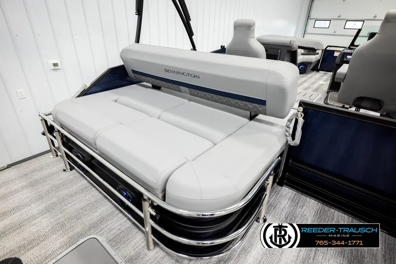 Slide: The Image of 2026 Bennington 22 MSBSE pontoon boat interior with plush seating and modern design. - 25