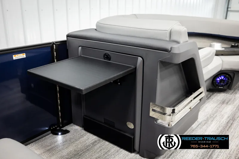 Slide: The Image of 2026 Bennington 22 MSBSE boat interior with fold-out table and modern seating. - 31