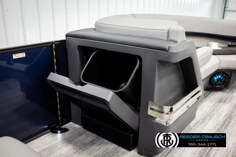 Slide: The Image of 2026 Bennington 22 MSBSE boat interior with storage compartment and seating. - 32