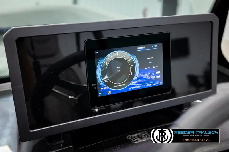 Slide: The Image of Dashboard display of 2026 Bennington 22 MSBSE boat with digital gauges and controls. - 39