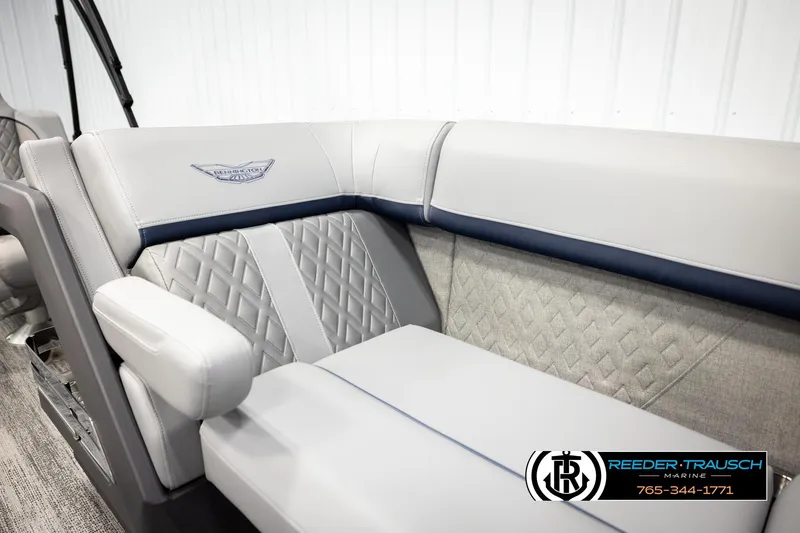 Slide: The Image of 2026 Bennington 22 MSBSE boat interior with luxurious gray seating and diamond stitching. - 43