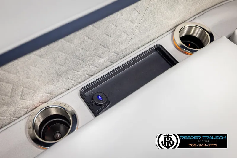 Slide: The Image of Interior of 2026 Bennington 22 MSBSE boat with cup holders and USB port. - 45