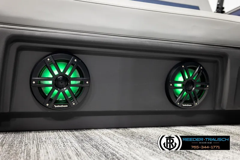 Slide: The Image of 2026 Bennington 22 MSBSE boat speakers with green LED lighting, Reeder-Trausch Marine logo. - 47