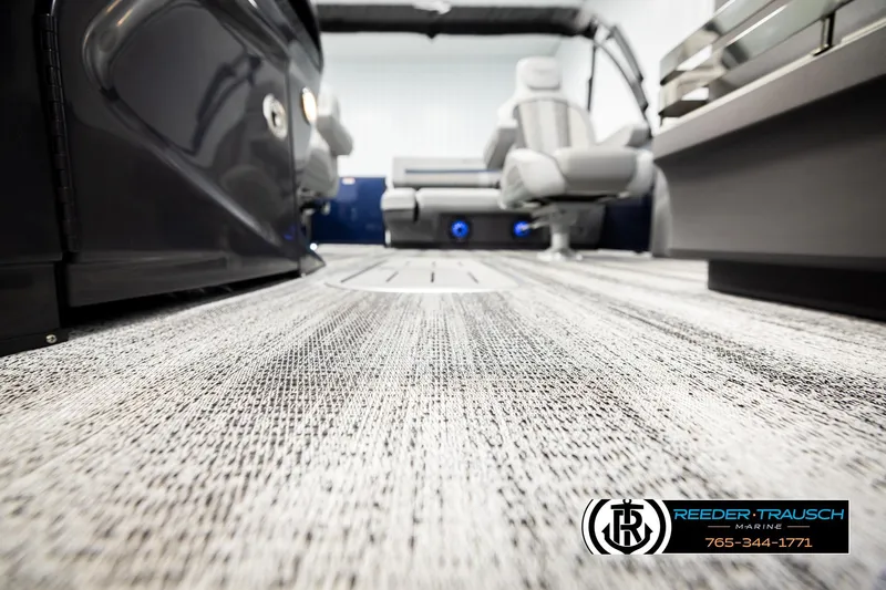 Slide: The Image of 2026 Bennington 22 MSBSE boat interior with modern seating and textured flooring. - 50