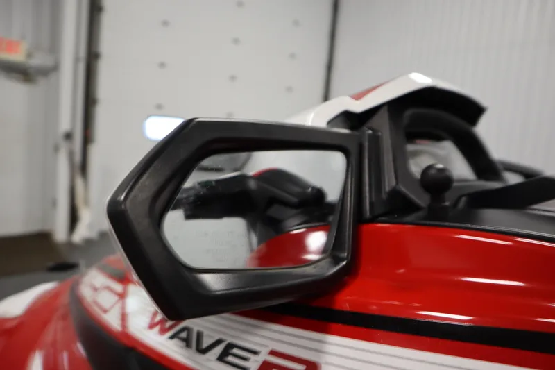 Slide: The Image of Close-up of a 2018 Yamaha GP1800 WaveRunner mirror and red body. - 11