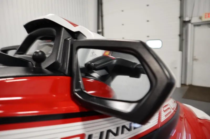 Slide: The Image of 2018 Yamaha GP1800 jet ski, red and white, close-up of handle and mirror. - 12