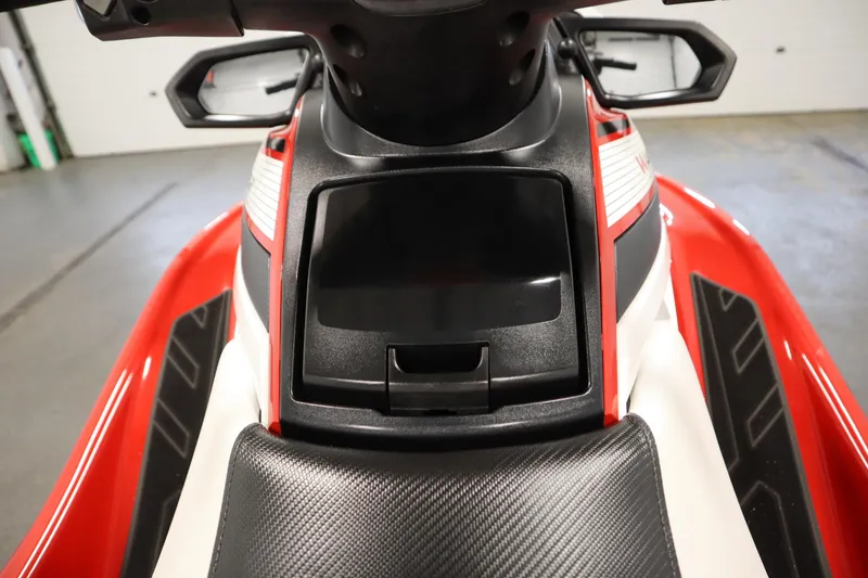 Slide: The Image of 2018 Yamaha GP1800 jet ski, red and black, close-up of dashboard and seat. - 17
