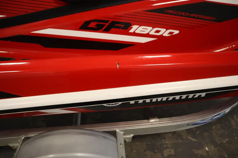 Slide: The Image of Red 2018 Yamaha GP1800 jet ski with visible branding and sleek design. - 31