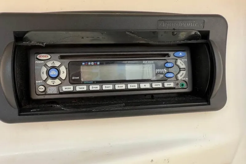 Slide: The Image of 2006 Hurricane GS194 Fundeck stereo system with Jensen MSR4050G radio in Aquatronics casing. - 9