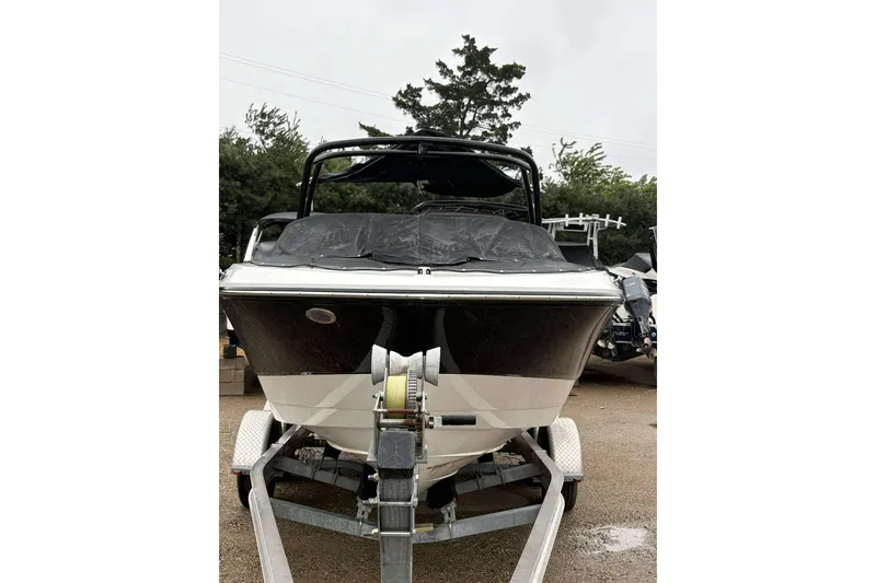 Slide: The Image of 2024 Monterey M205 boat on trailer, covered and ready for transport. - 3