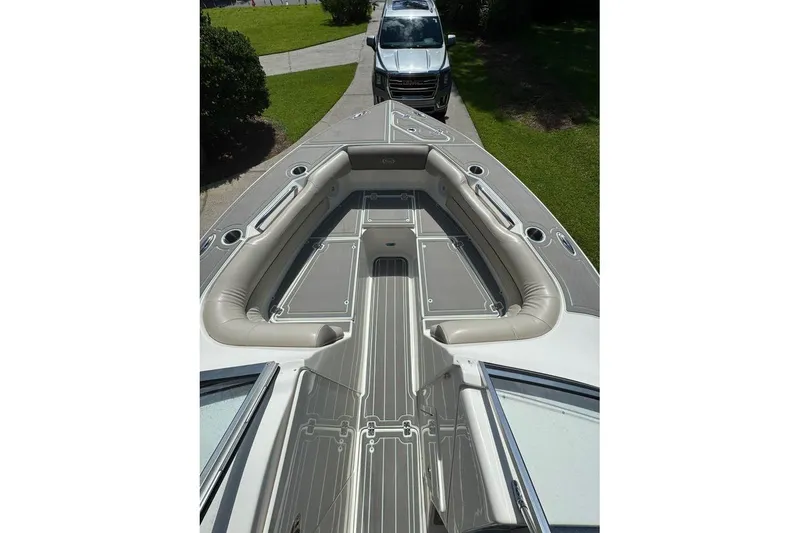 Slide: The Image of 2021 Key West 239 DFS boat interior with cushioned seating and sleek design. - 10