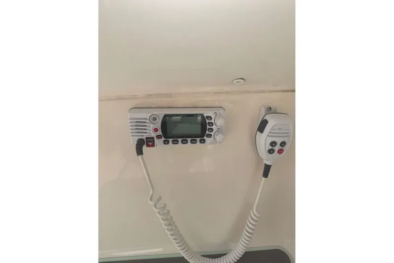 Slide: The Image of VHF radio system on 2021 Key West 239 DFS boat dashboard. - 15