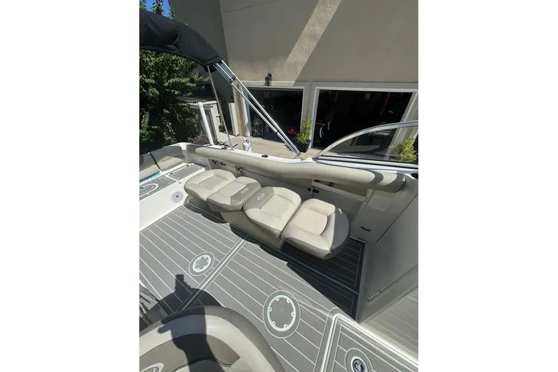 Slide: The Image of 2021 Key West 239 DFS boat interior with cushioned seating and sleek design. - 18