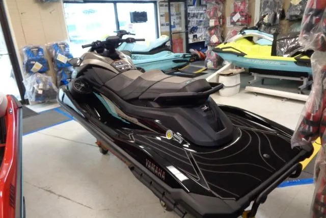 Slide: The Image of 2025 Yamaha WaveRunner GP SVHO jet ski displayed in a showroom. - 2