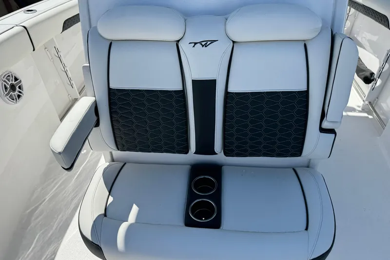 Slide: The Image of 2025 Tidewater 282 CC Adventure boat seating with cup holders and stylish upholstery. - 30